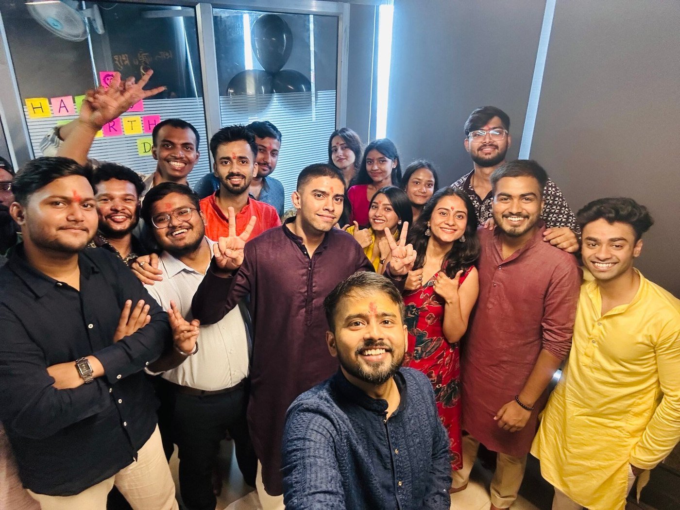 Brand Miz colleagues celebrating a festival together at the office